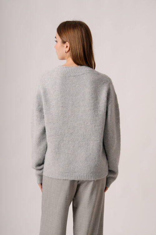 Sweater Con Lentejuelas Delantero Cuello V Diana